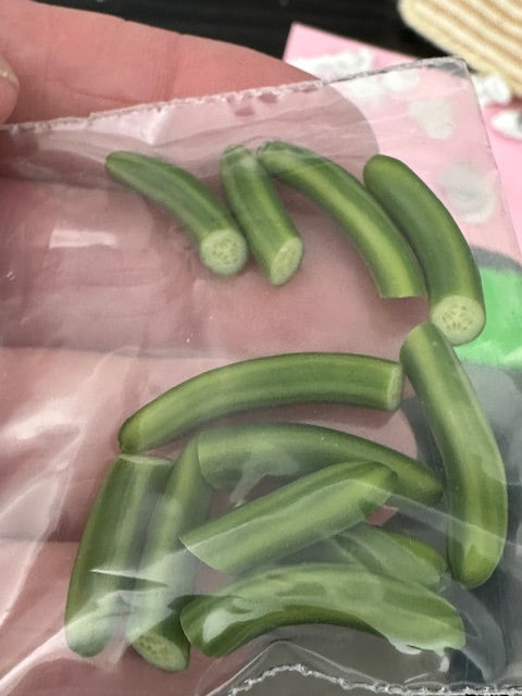 Handcrafted cut cucumbers-price is per cucumber (1) by Angie Scarr
