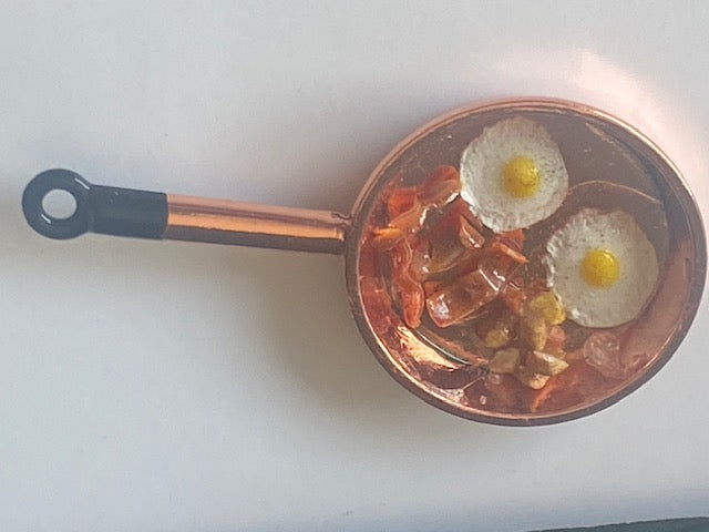 Handcrafted eggs in a pan