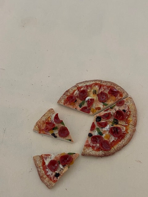 Handcrafted pizza in slices-pepperoni