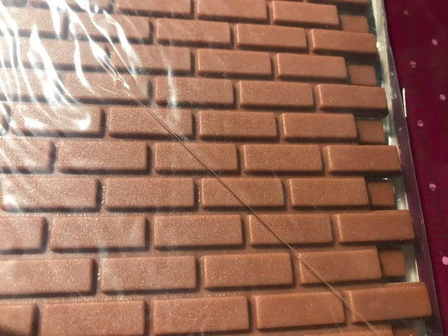 Three Dimensional Brick covers approx 180 square inches