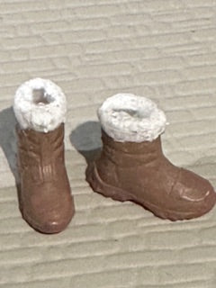 Pair of winter boots with fuzzy trim