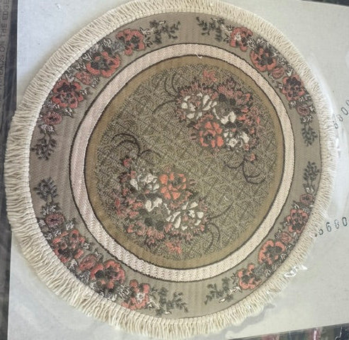 Woven round rug (approx 5.75 inches round)