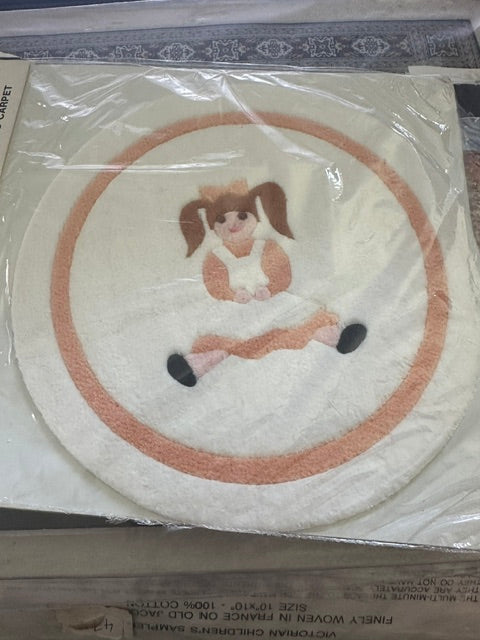 Round area rug (approx 6 inches round) by Mini Graphics