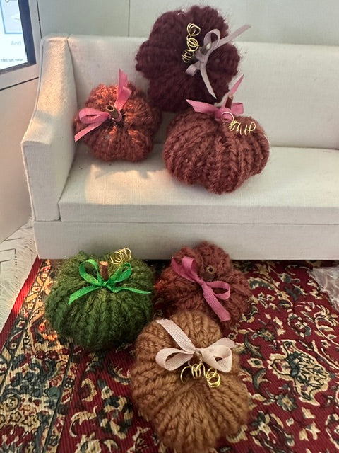 Hand knitted pumpkins - approx 1.5 inch in diameter