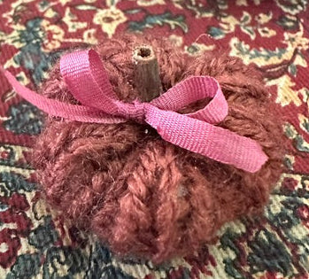 Hand knitted pumpkins-approx 1 inch in diameter