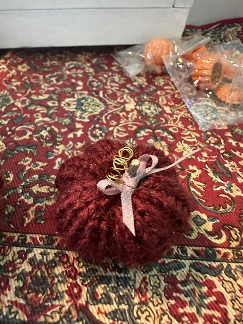 Hand knitted pumpkins - approx 1.5 inch in diameter