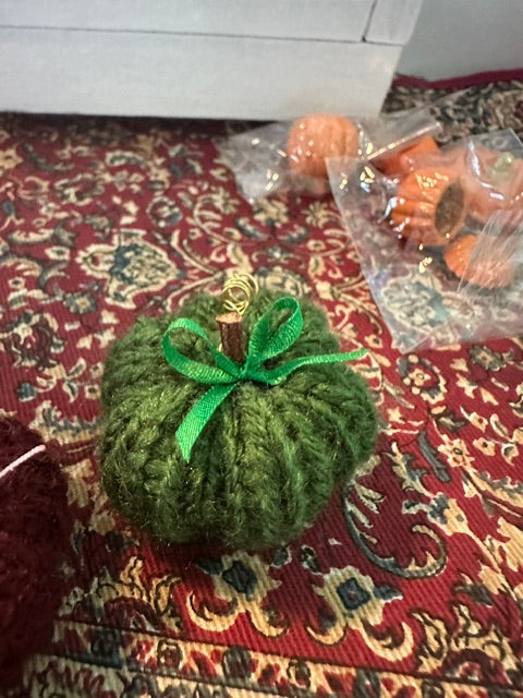 Hand knitted pumpkins - approx 1.5 inch in diameter