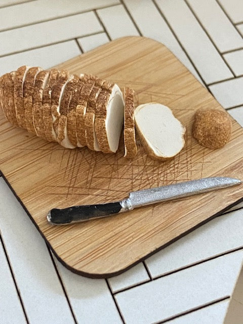 Handcrafted bread with knife