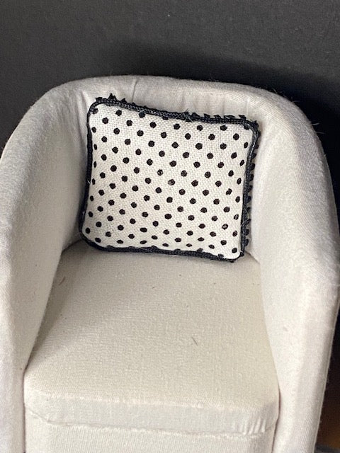 Assorted black and white pillows