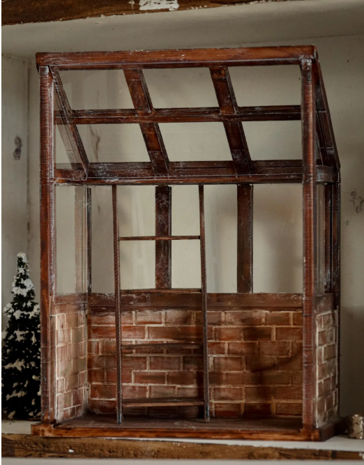 Miniature greenhouse with ladder