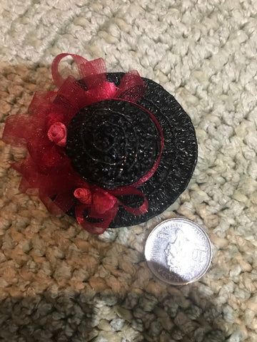 Black and red Hat designed by retired artist M3