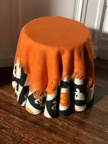 Assorted halloween skirted tables